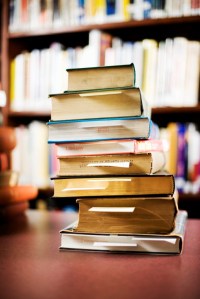 stack of books in a library